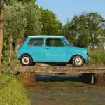 An Austin Mini Cooper S on a little bridge