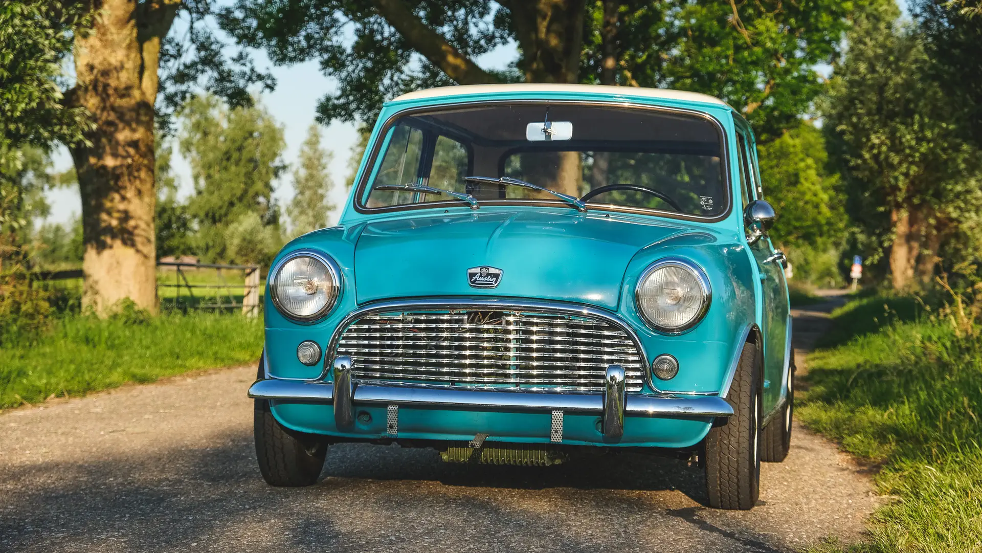 A lightblue Austin Mini Cooper S