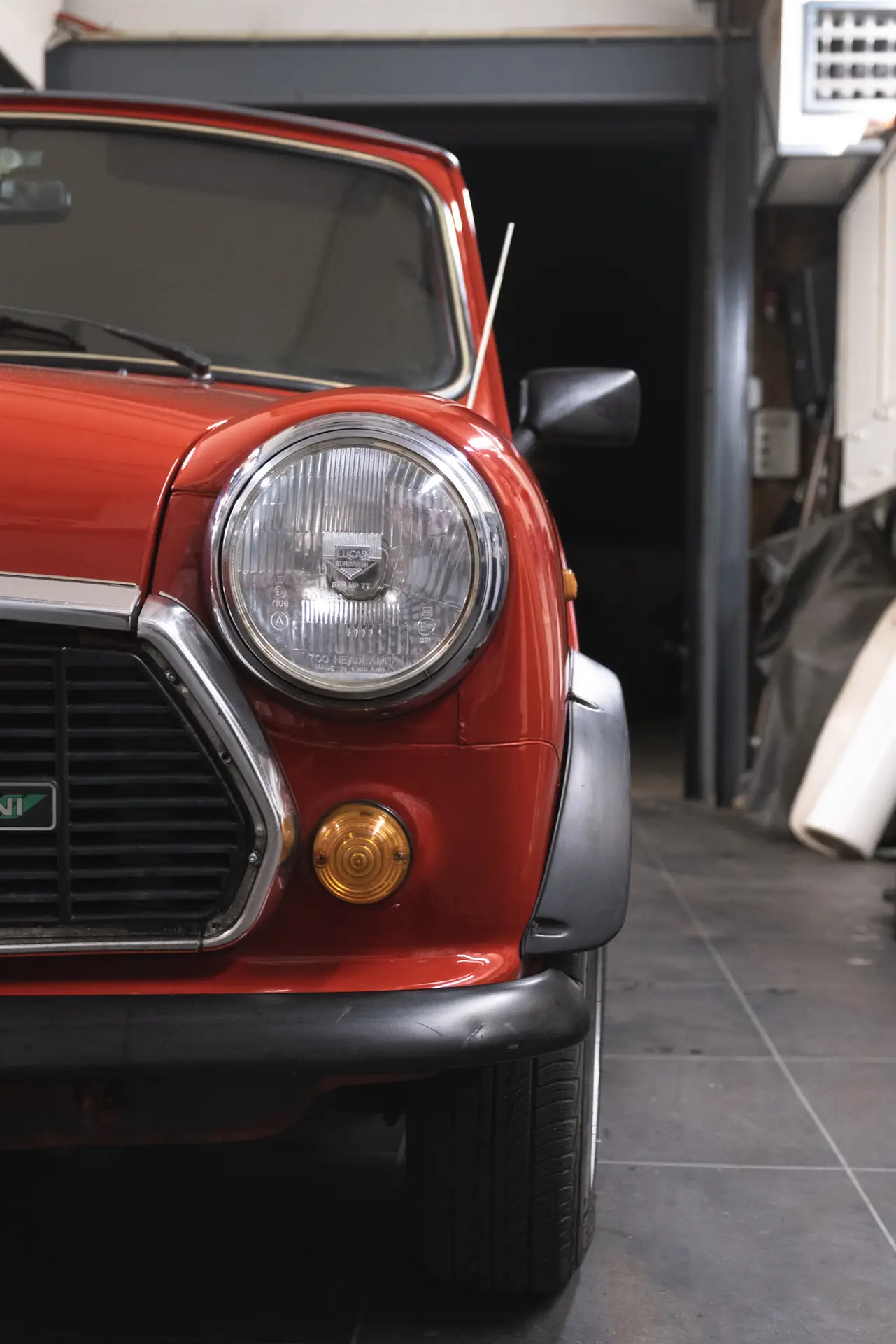 The left front of a red Austin Mini 1000 E Magic