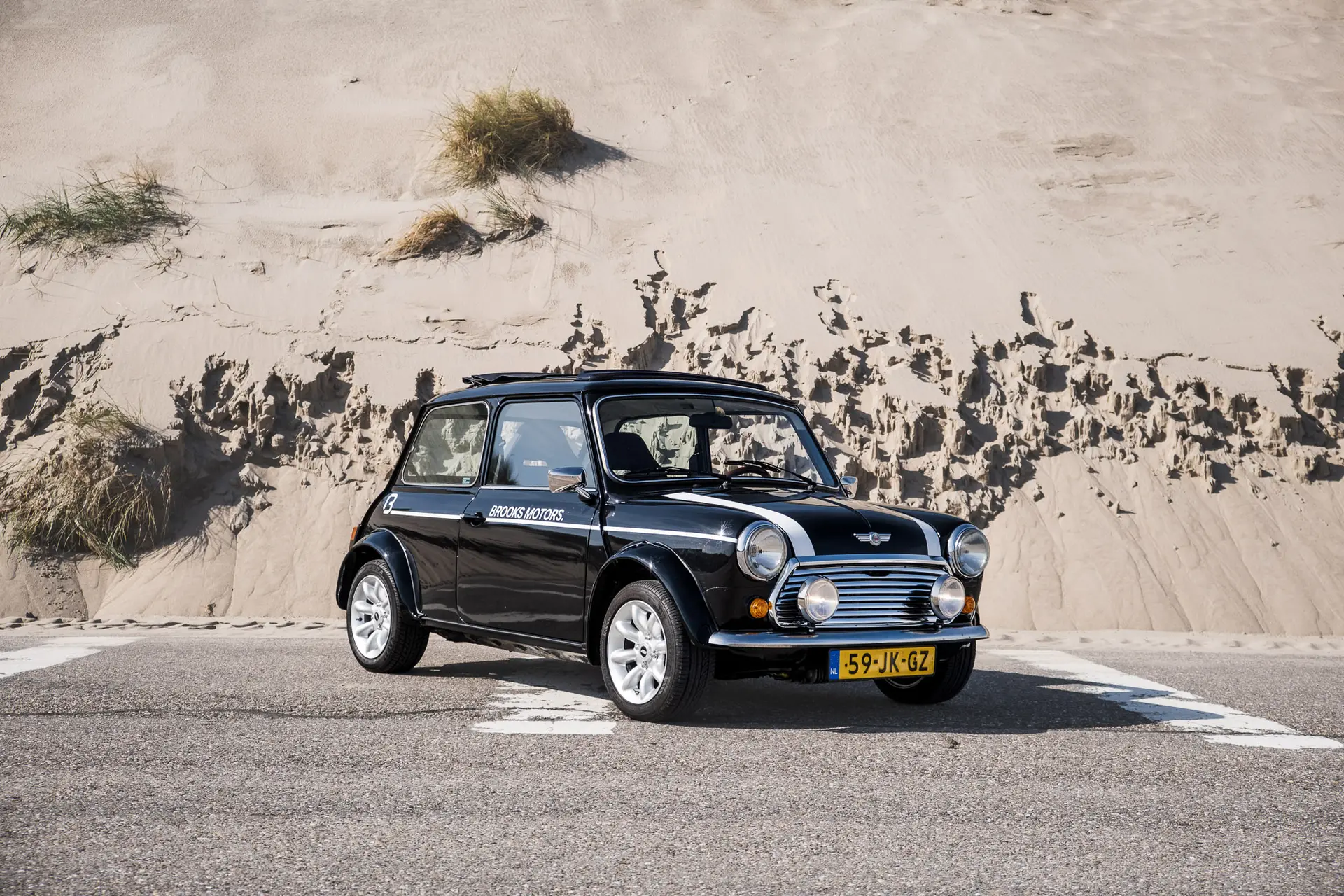 Black Mini Classic in the sand