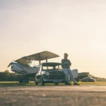 brooks mini classic with tiger moth airplane and tom van koevorden in front