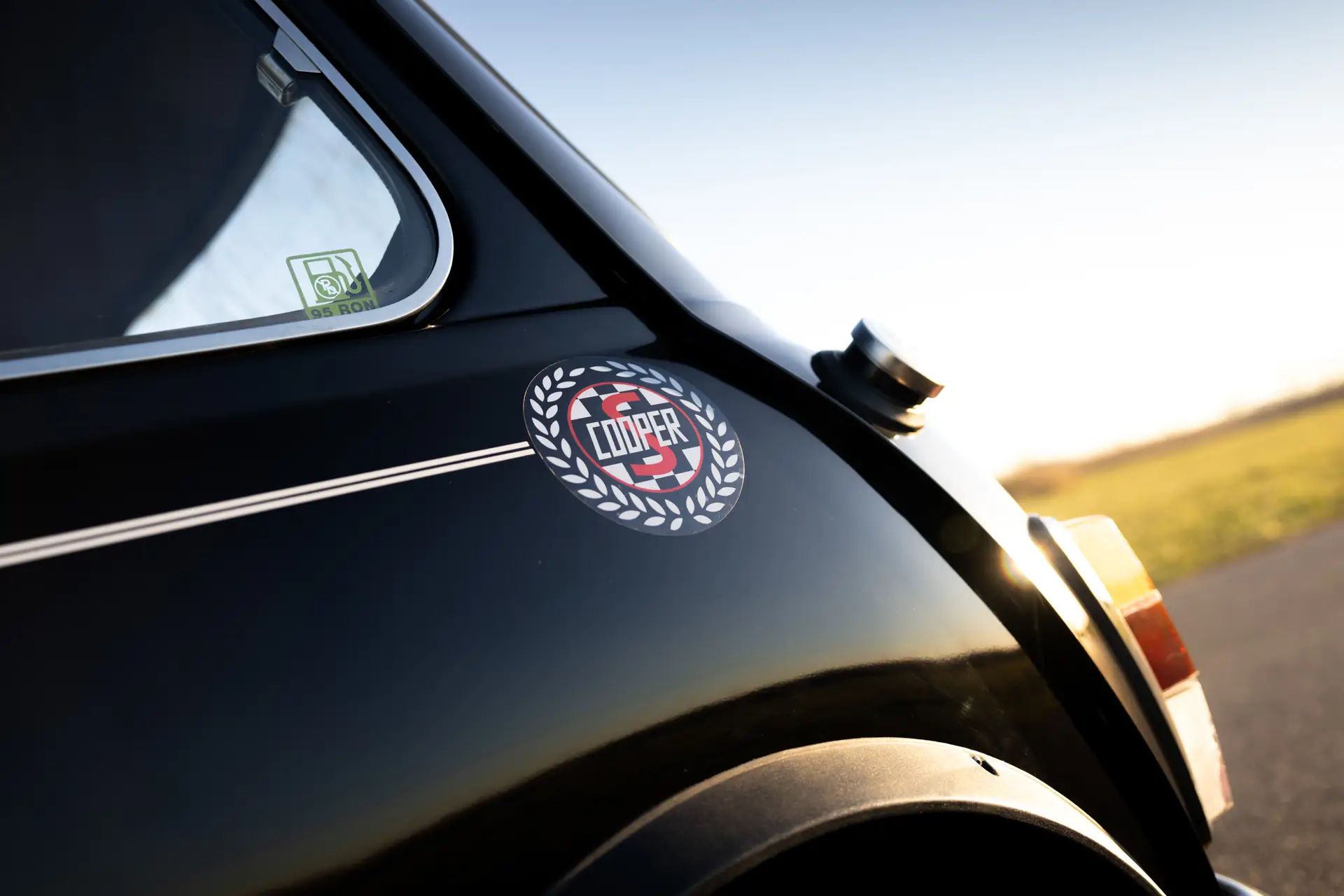 mini classic cooper S rear end with decal having the white laurel