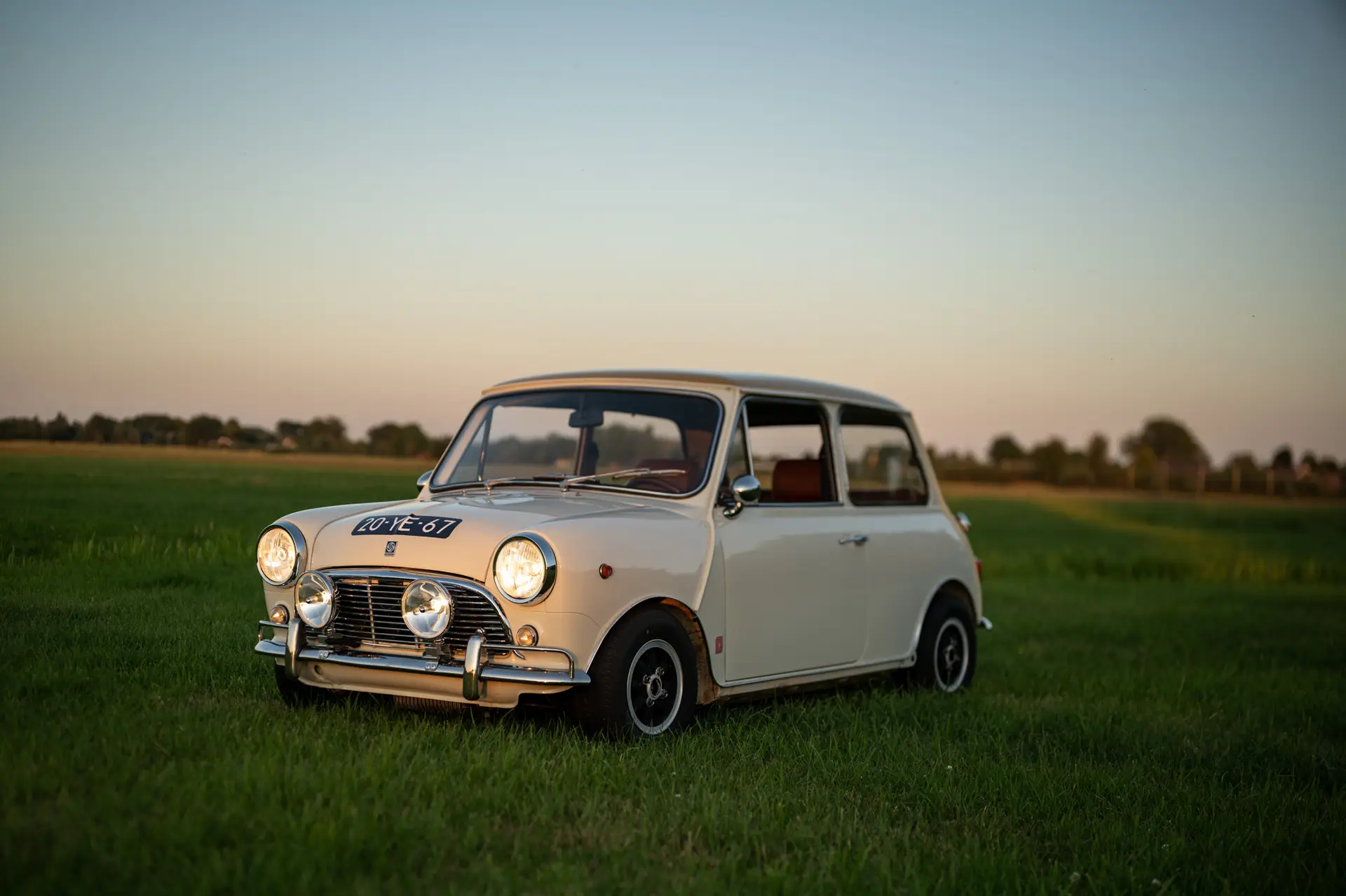 mini classic white with rose petal rims and yokohama A032 tyres. fitted with stainless steel bumpers with overriders