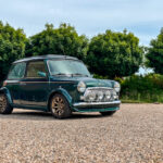 mini classic MPi custom build with sportpack bodykit, spot lights on the front, open roof, painted in britisch racing green and a lot of custom upgrades as bronze painted rims, custom striping